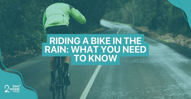 A man riding a bike in the rain