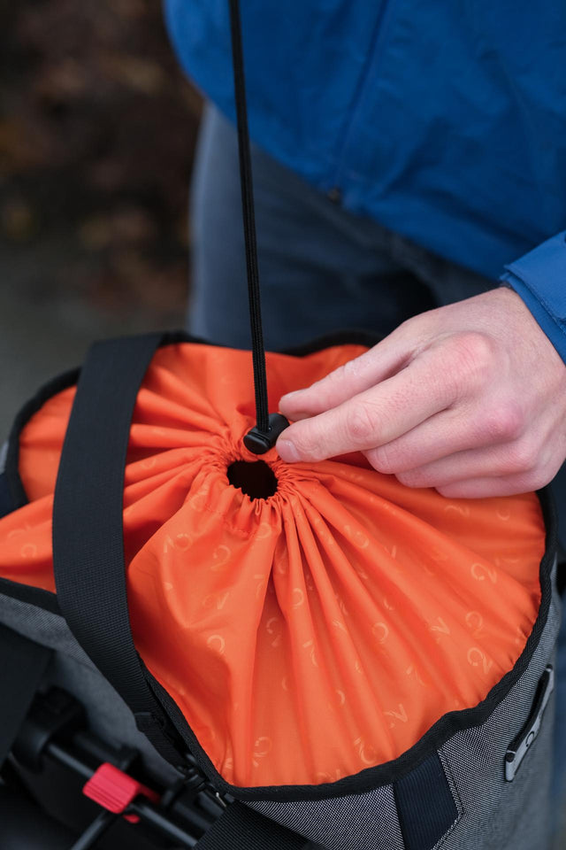 Two Wheel Gear Grey Solo Market Pannier attached to bicycle being tightened