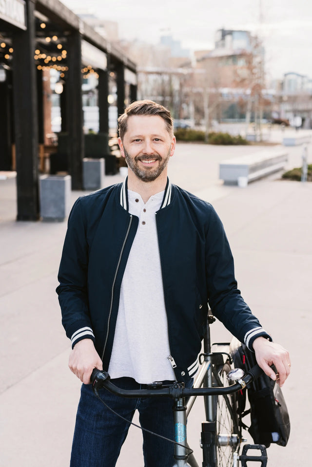 Tom Babin of Shifter with bicycle and Two Wheel Gear Pannier Backpack