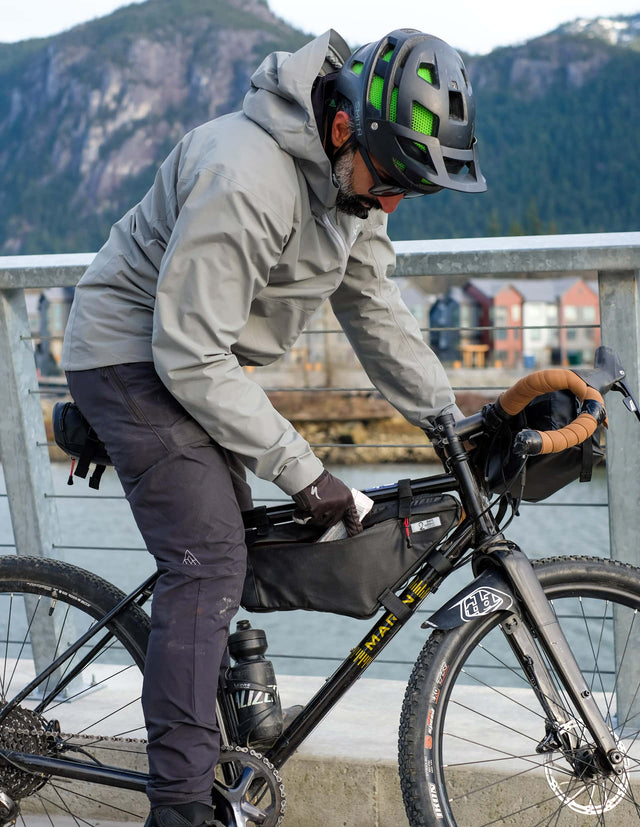 Man biking with Mamquam bike Frame Bag