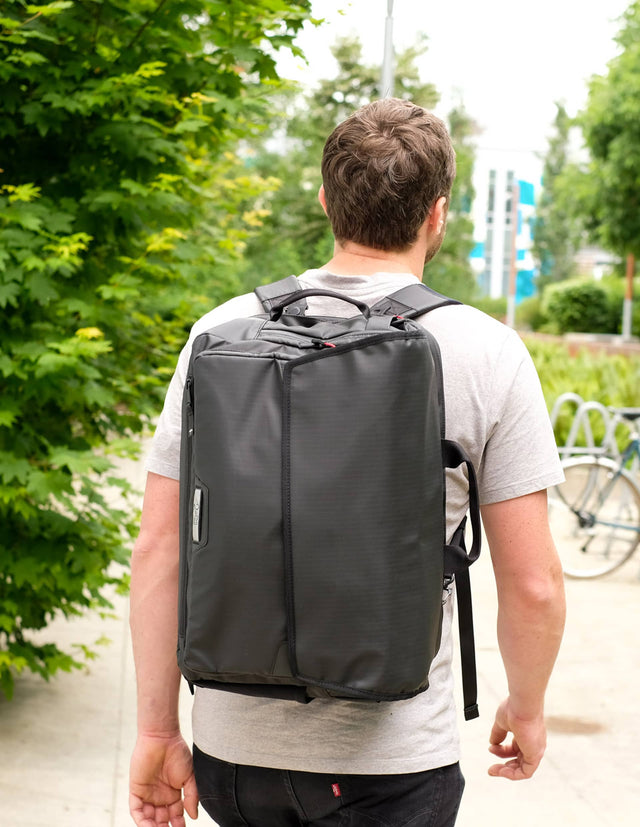 Man wearing Two Wheel Gear Magnate Pannier Messenger