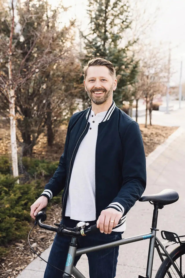 Ambassador Tom Babin on a bike