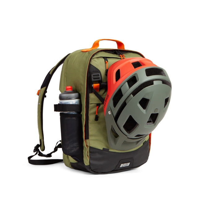 Weatherproof Two Wheel Gear Pannier Backpack Convertible 2.0 LITE (22L) in olive green with helmet and water bottle