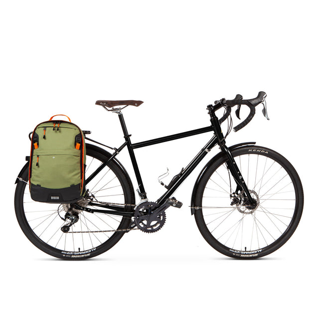 Weatherproof Two Wheel Gear Pannier Backpack Convertible 2.0 LITE (22L) in olive green attached to bike for commuting