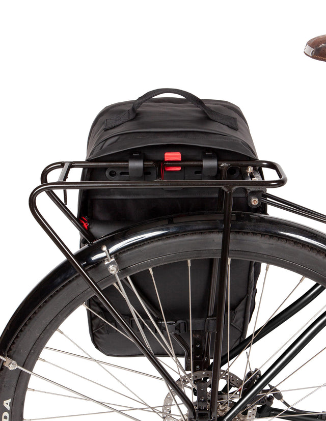 Weatherproof Two Wheel Gear Pannier Backpack Convertible 2.0 LITE (22L) in Black Ripstop attached to bike for commuting