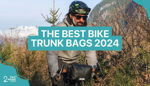 a man on a bike with a bike trunk bag