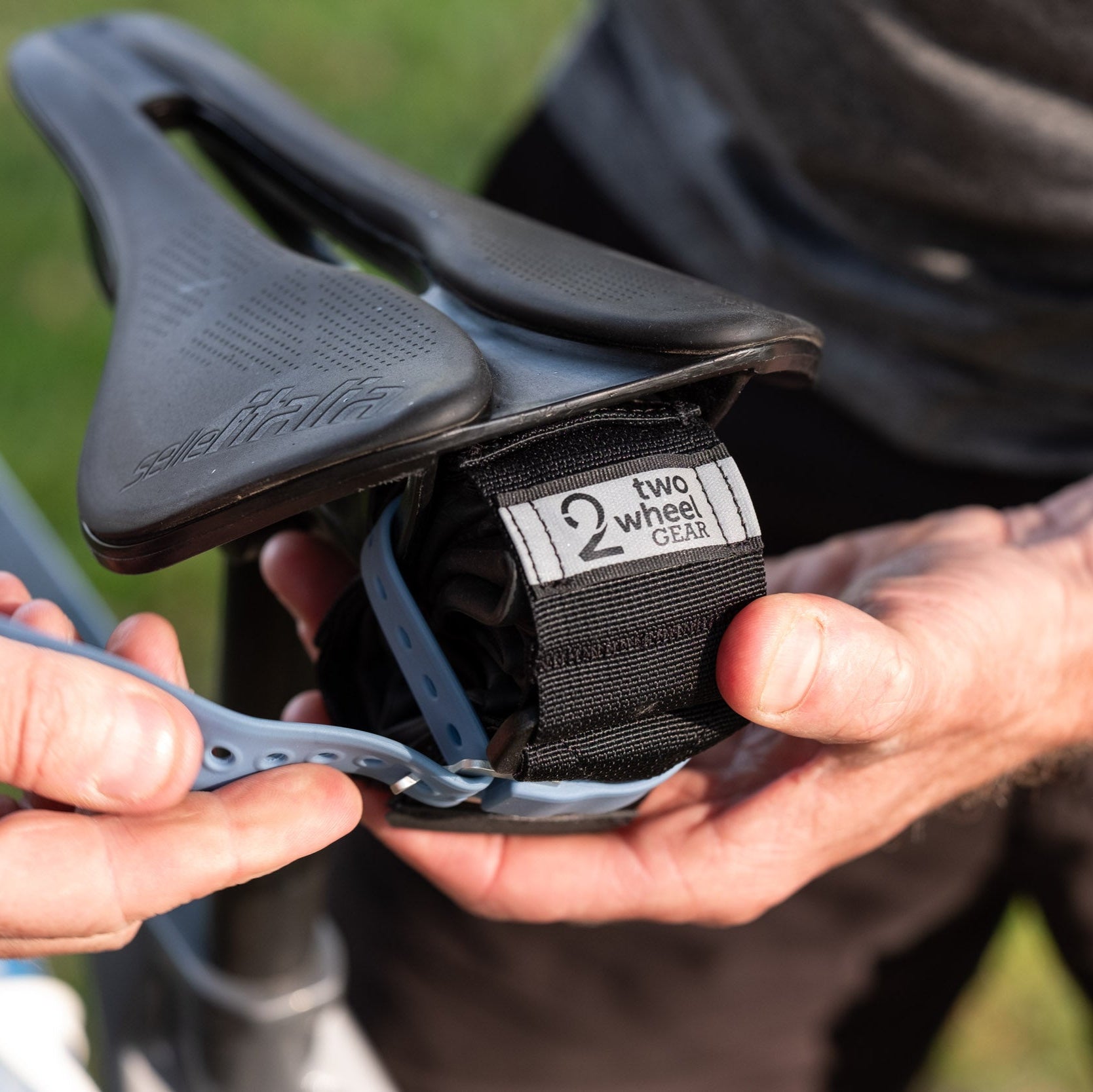 Tack Strap Tool Wrap Attaches to Bike Frame Saddle Handlebars and Two Wheel Gear