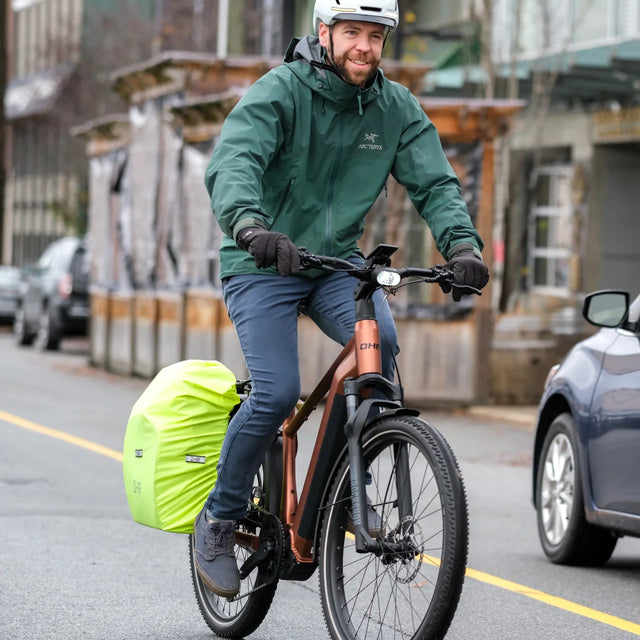 Two Wheel Gear - Inverter Pannier Backpack Man riding electric bike