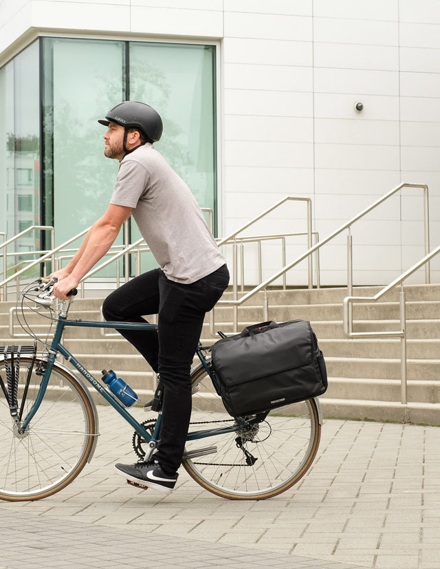 Two Wheel Gear Magnate Messenger Bag on a bike rack.