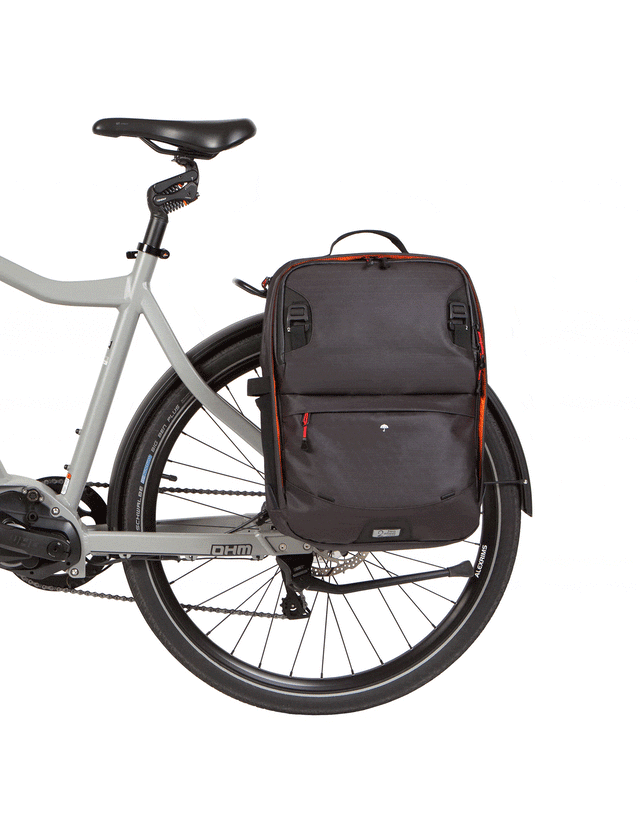 Two Wheel Gear Alpha Pannier Backpack Smart on bike rack with and without the rain cover.