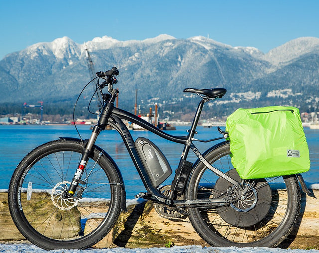 Classic Garment Pannier Replacement Rain Cover on a bike with the ocean and mountains in the backdrop (443535524)